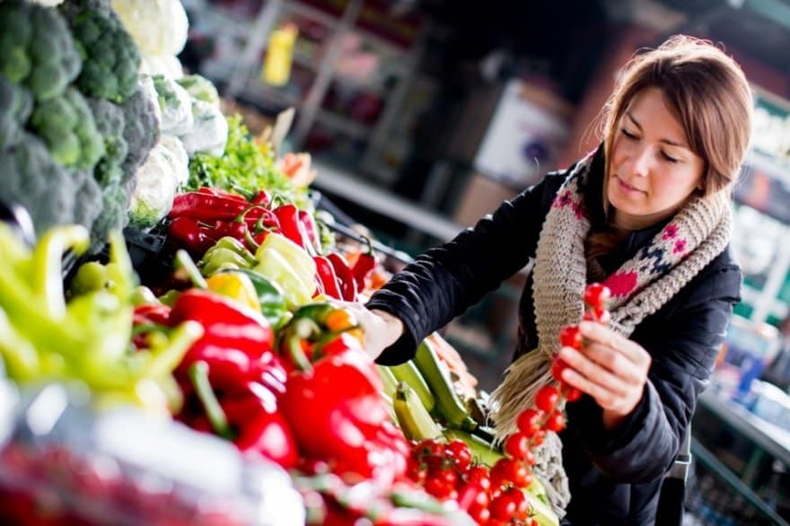 woman buying organic vegetables