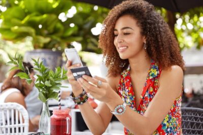 woman using debit card