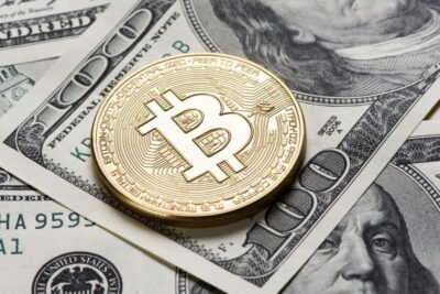 bitcoin on one hundred dollar bills