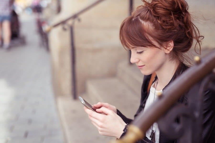 woman using smartphone