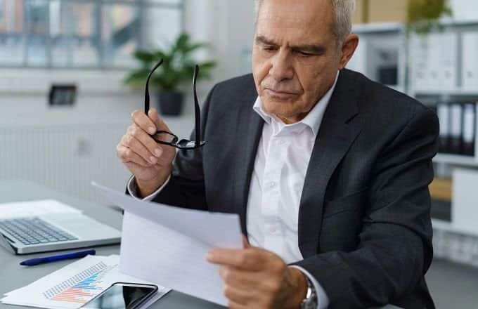 man viewing disute letter